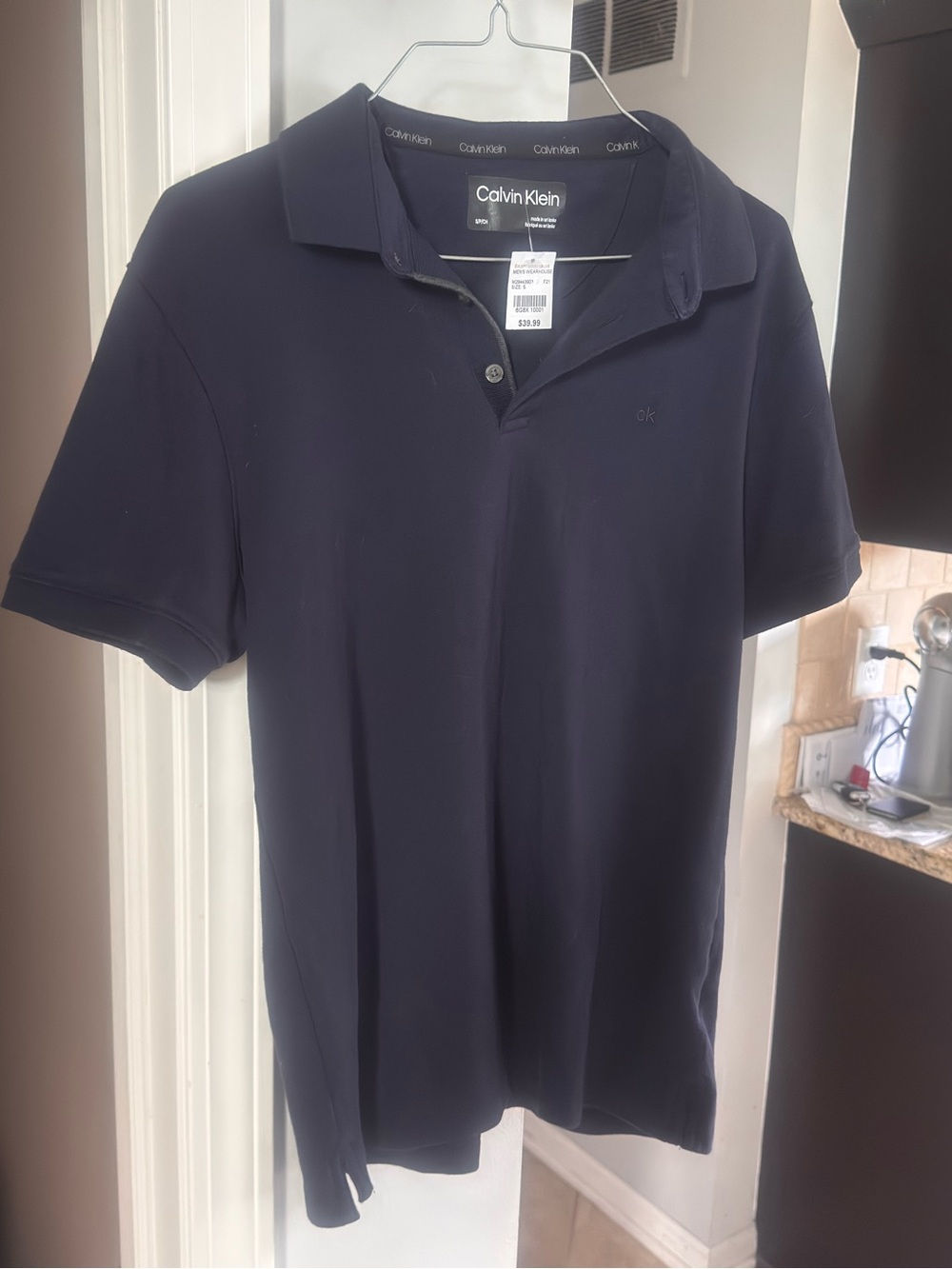 Calvin Klein Men's Dark Navy Polo Shirt with Subtle Logo